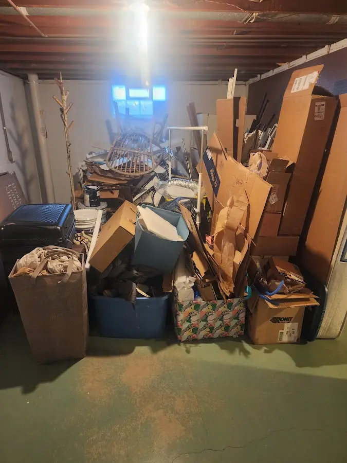 Roll-off dumpster container at job site for 4 Yard Dumpster Rental in Covington